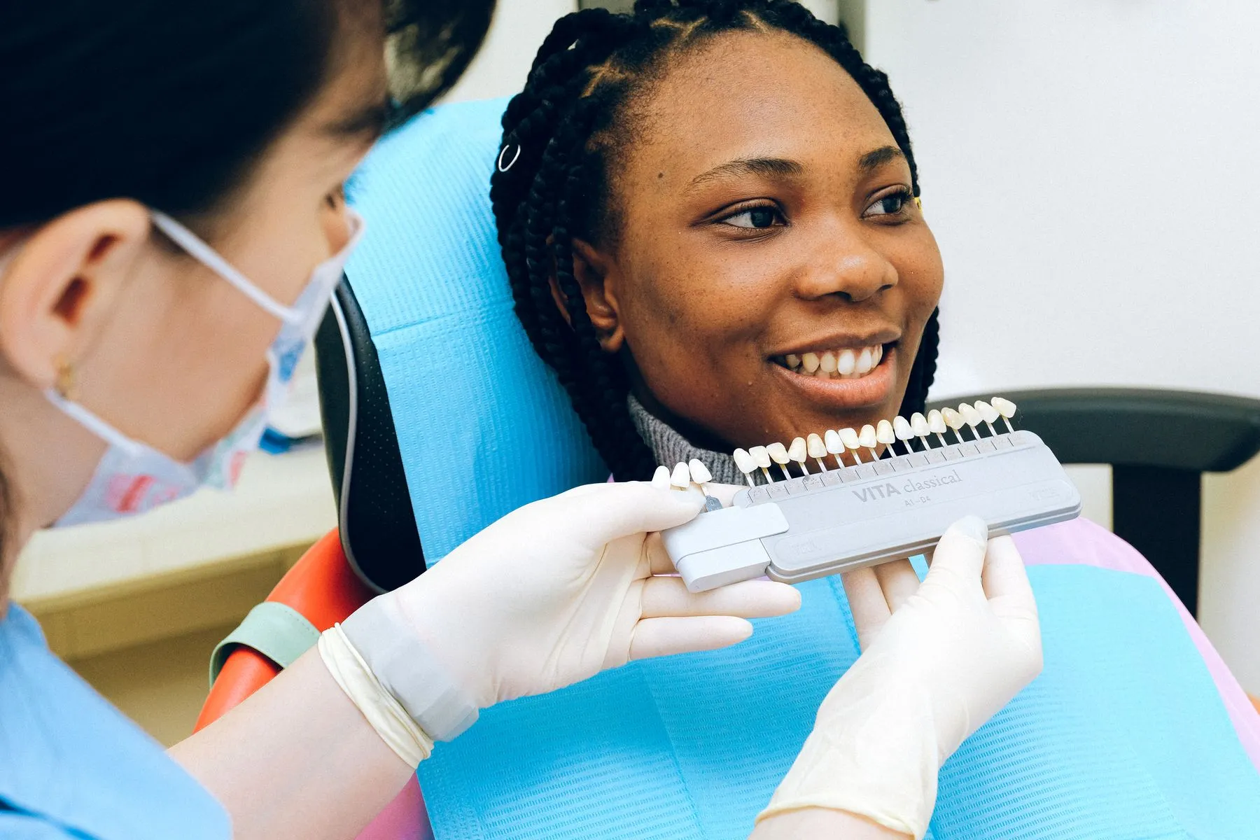 A smiling patient during a cosmetic consultation